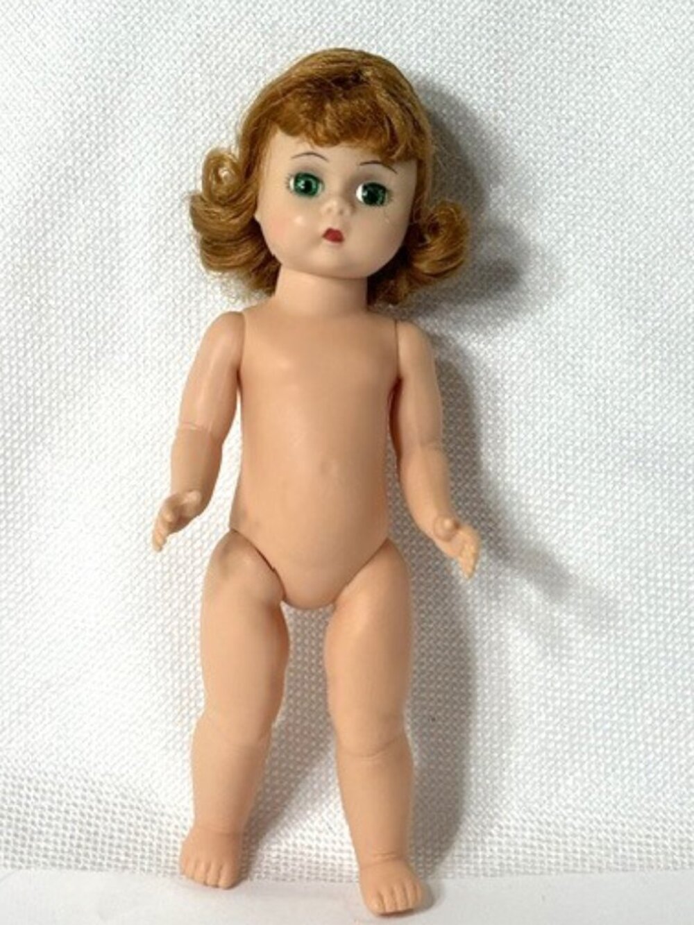 Nude Madame Alexander restrung 8" redheaded doll.